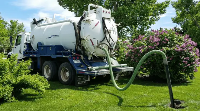 Professional vacuum truck performing residential drainage and septic maintenance in Oakland, CA